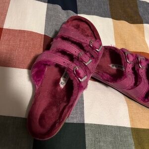 Fur-lined Magenta Birkenstocks